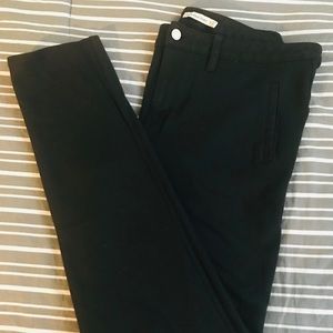 Black stretch pants with button